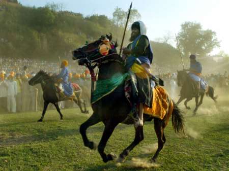Sikh on horseback during a Hola Mohalla festival. Photo:Reuters/Kamal Kishore. Source: sikhiwiki.